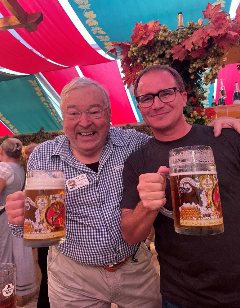 beer fest holding big mugs